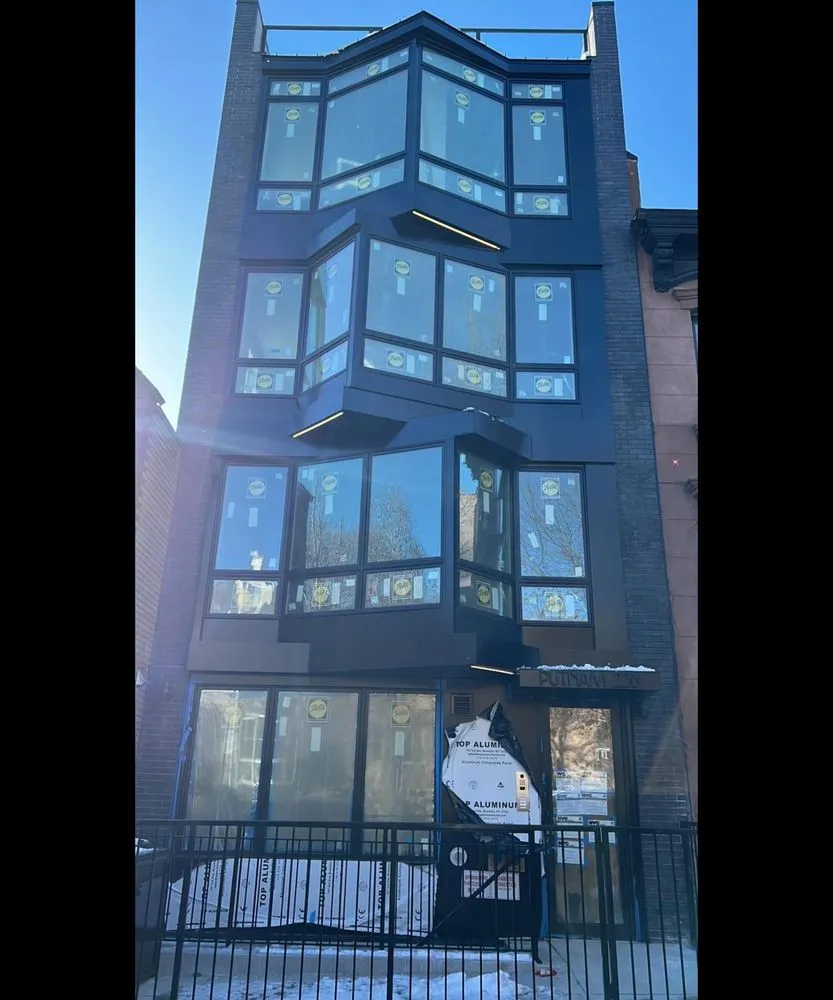 Slide of NY Best Roofer