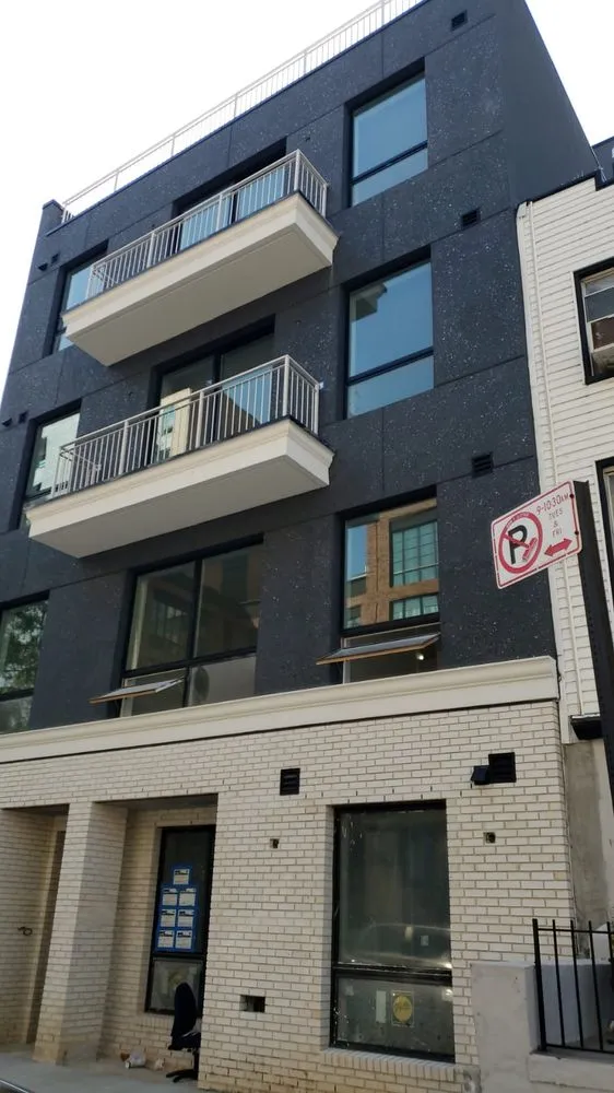 Slide of NY Best Roofer