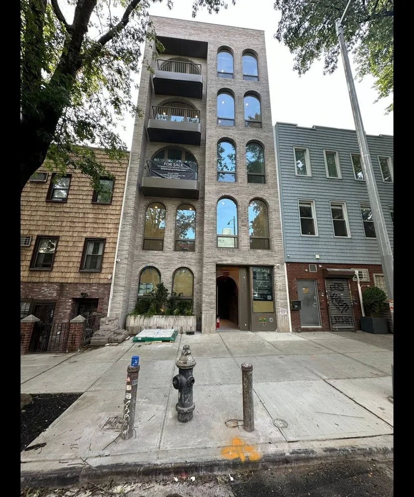 Slide of NY Best Roofer