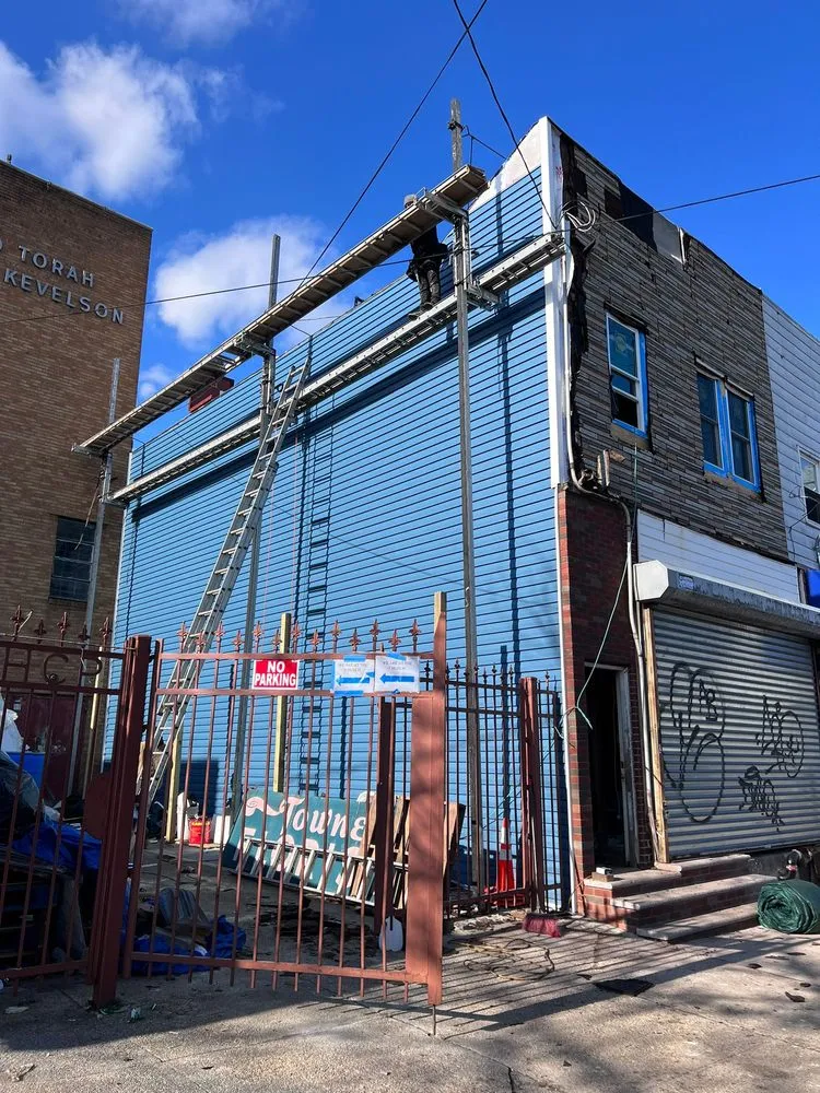 Slide of NYC Best Roofing