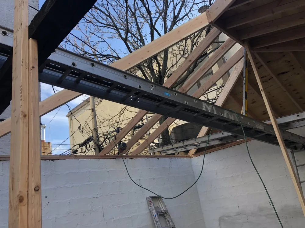 Slide of NYC Best Roofing