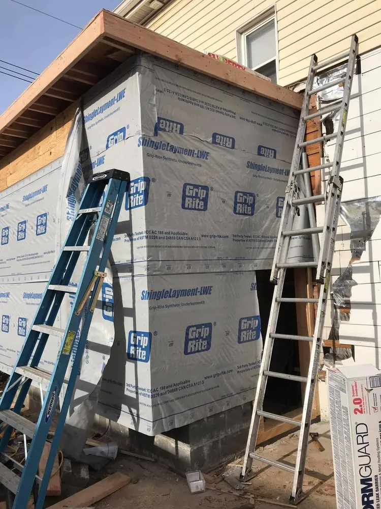 Slide of NYC Best Roofing