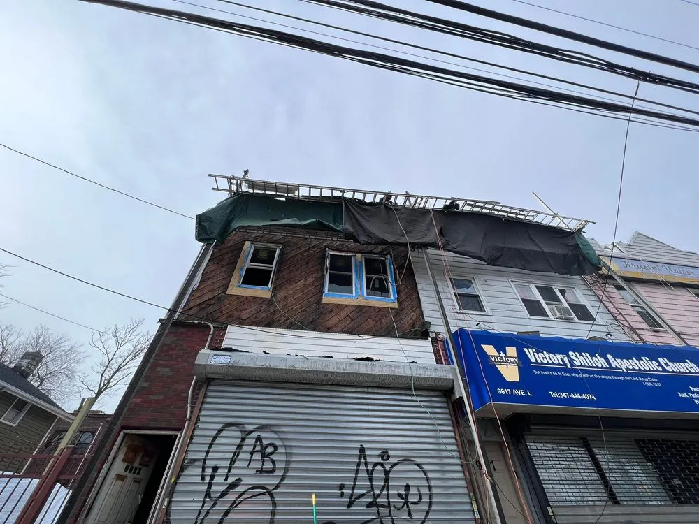 Slide of NYC Best Roofing