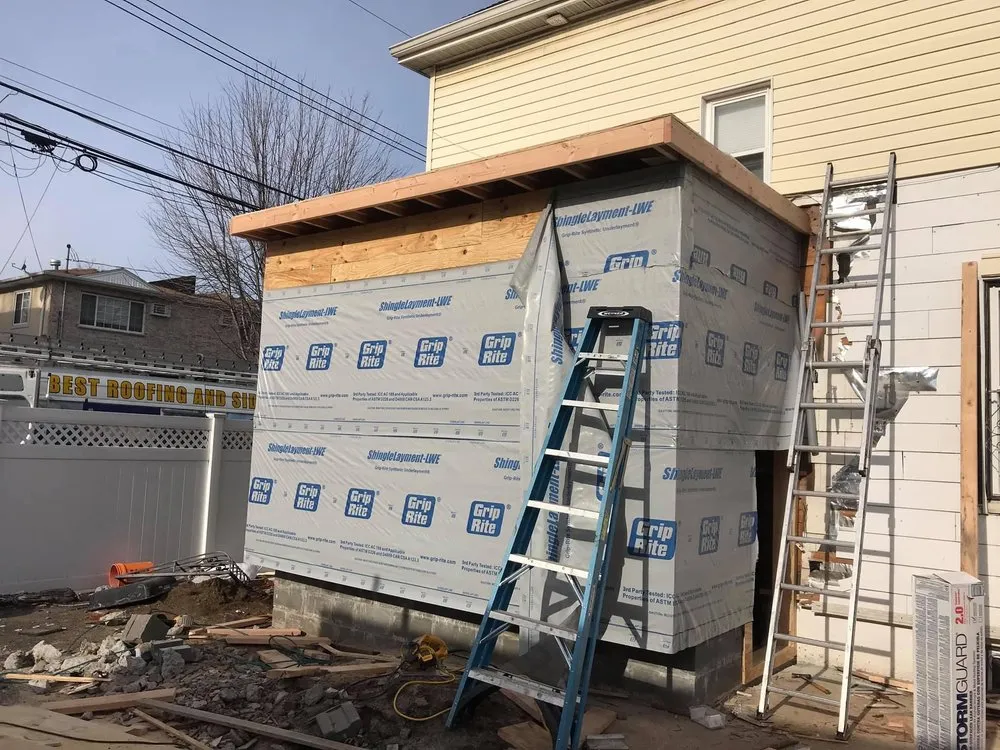 Slide of NYC Best Roofing