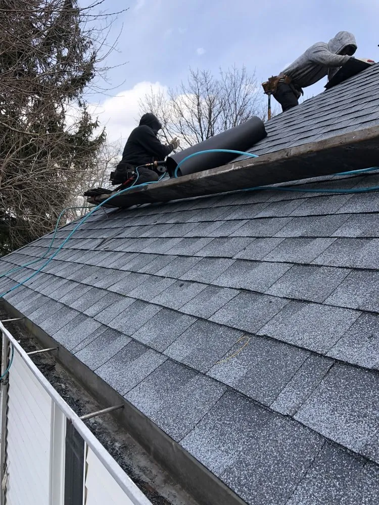 Slide of NYC Best Roofing