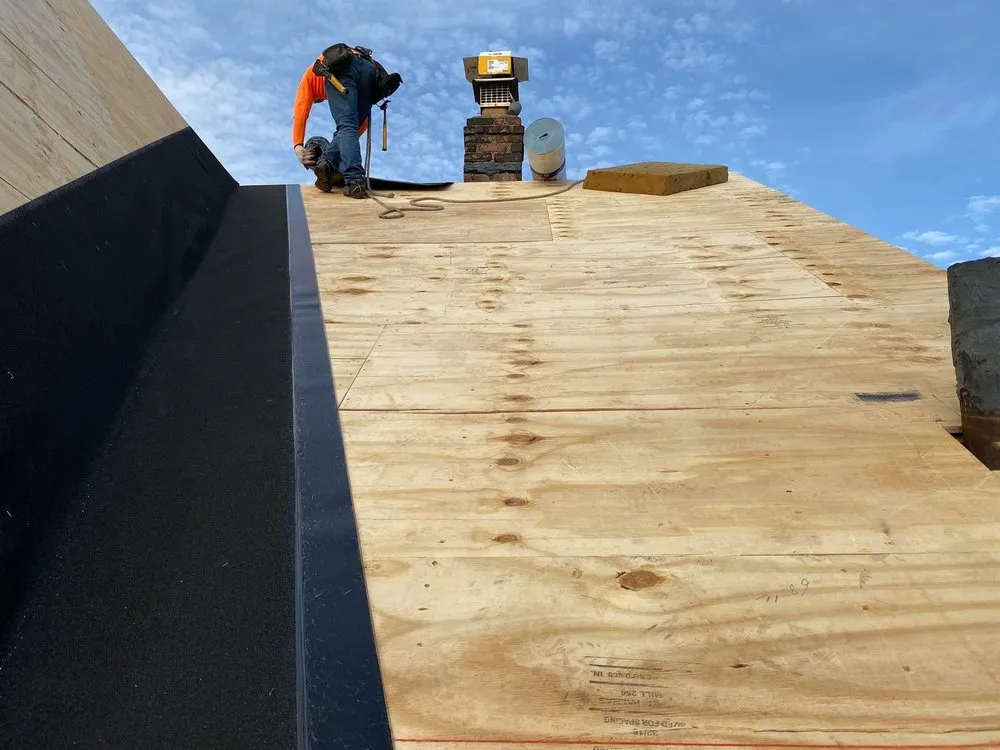 Slide of NYC Best Roofing