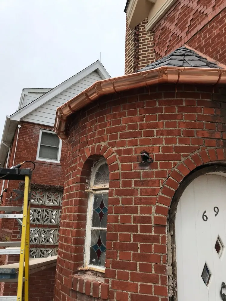 Slide of NYC Best Roofing