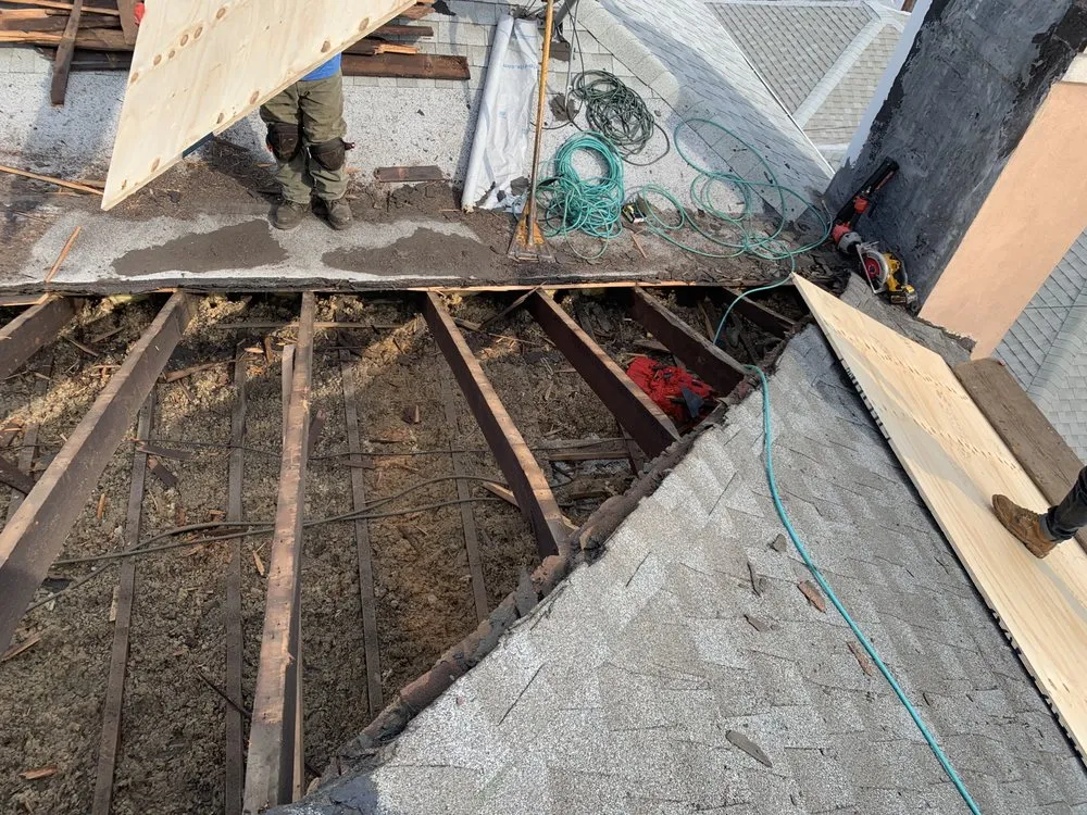 Slide of NYC Best Roofing