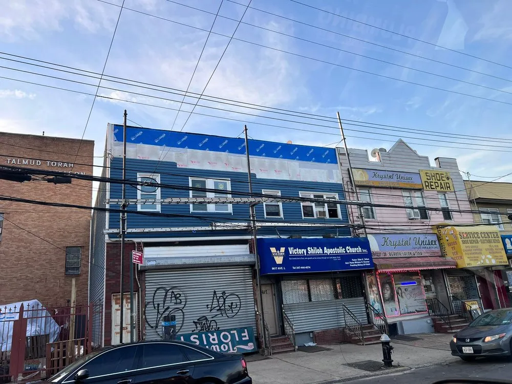 Slide of NYC Best Roofing