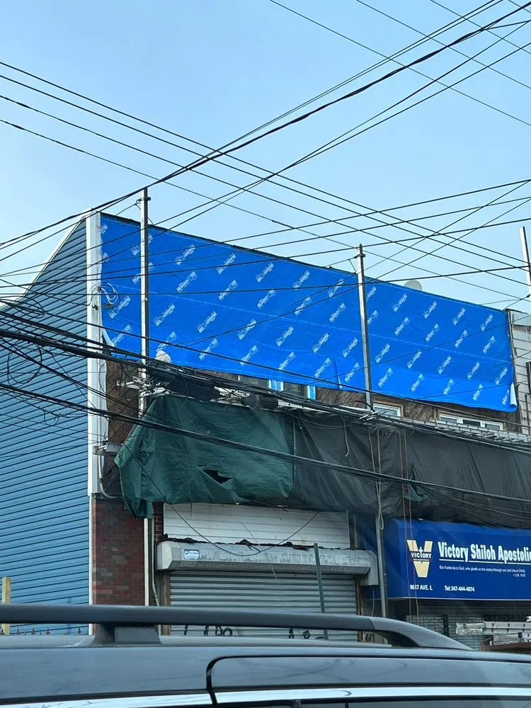 Slide of NYC Best Roofing
