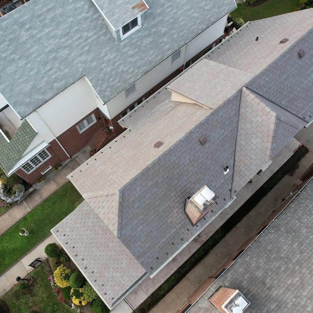 Slide of NYC Best Roofing