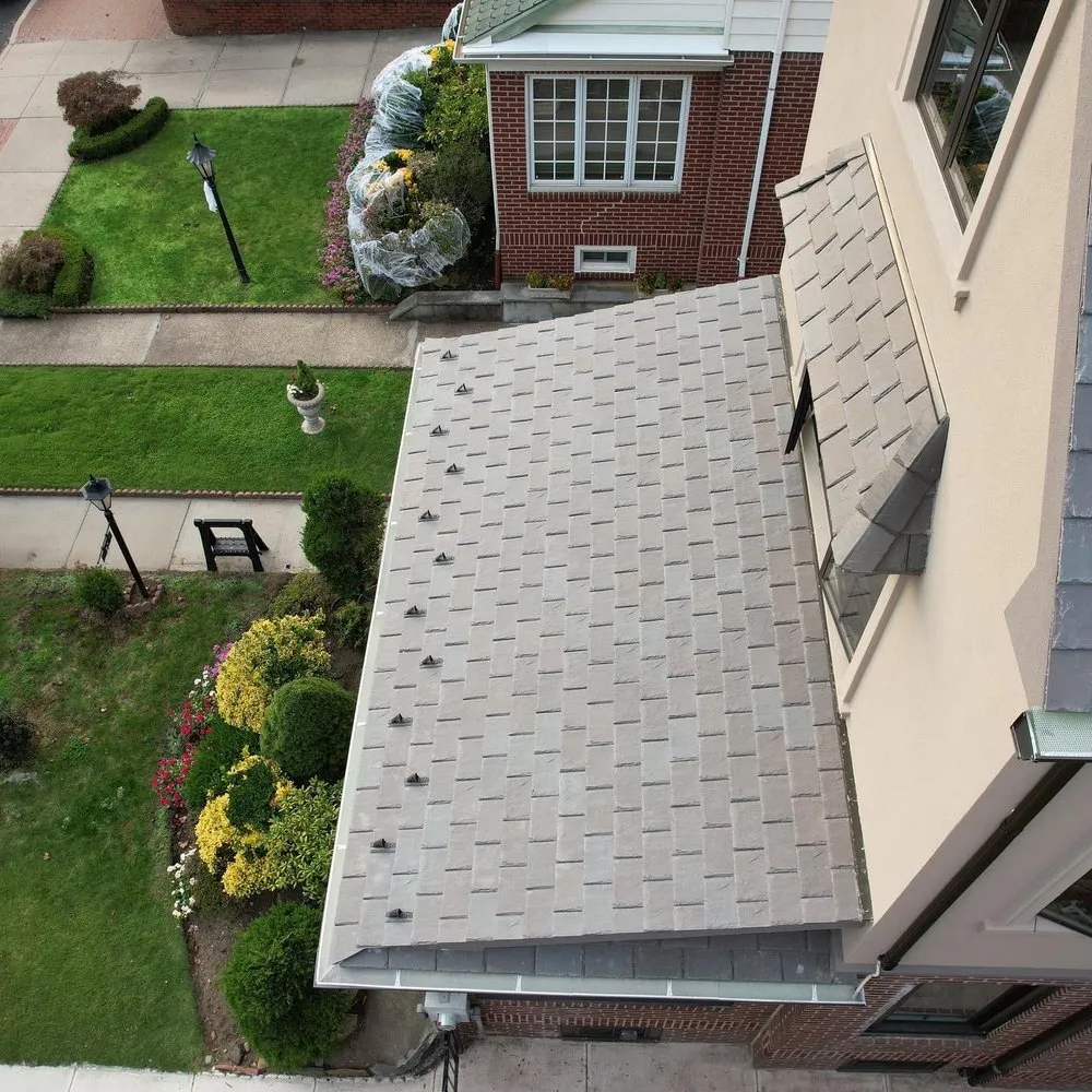 Slide of NYC Best Roofing