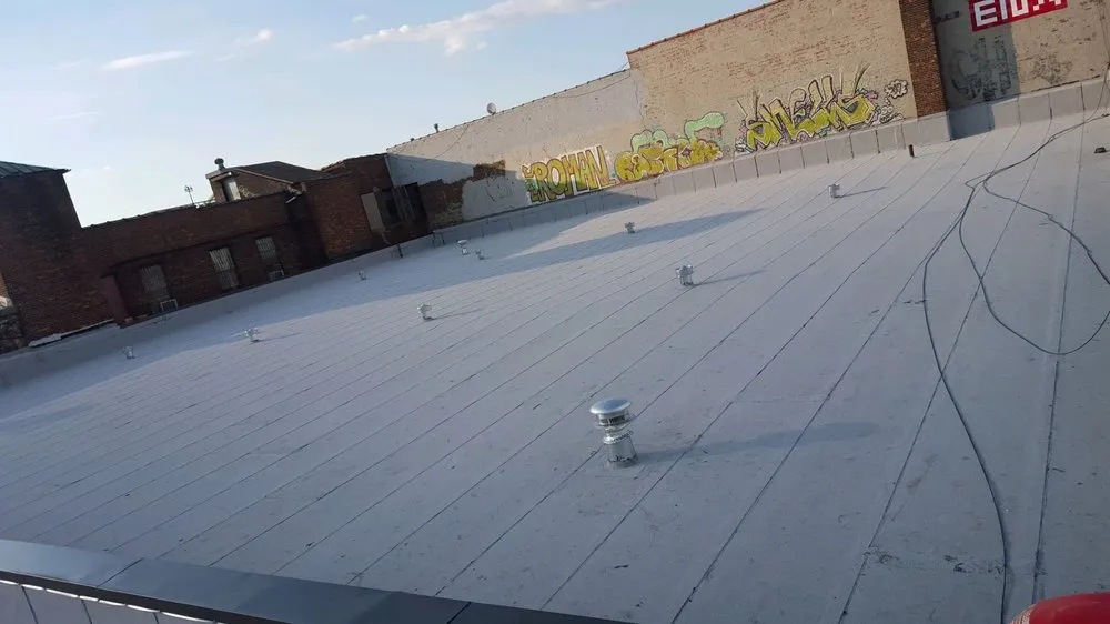 Slide of NYC General Pro Roofing