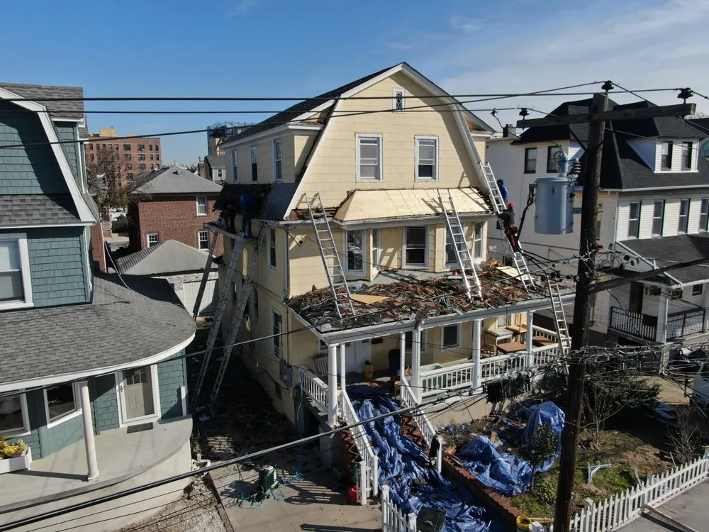 Slide of NYC General Pro Roofing