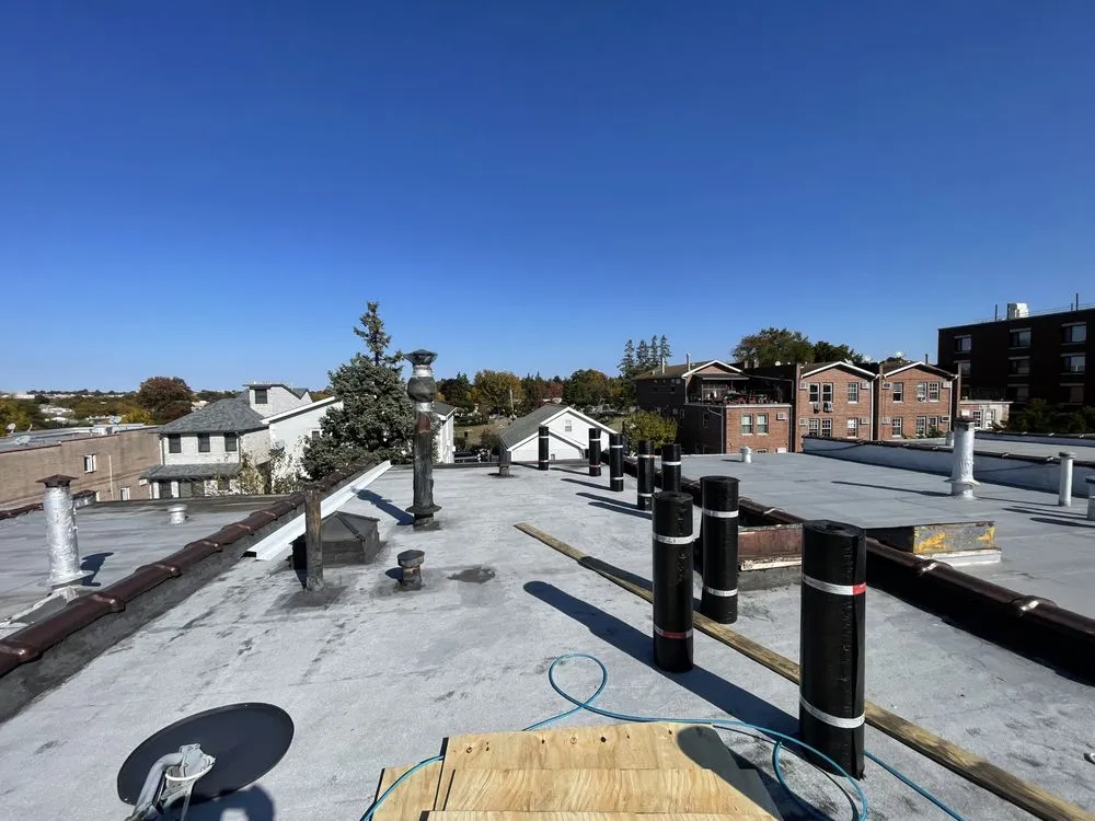 Slide of NYC Rooftop Contractor