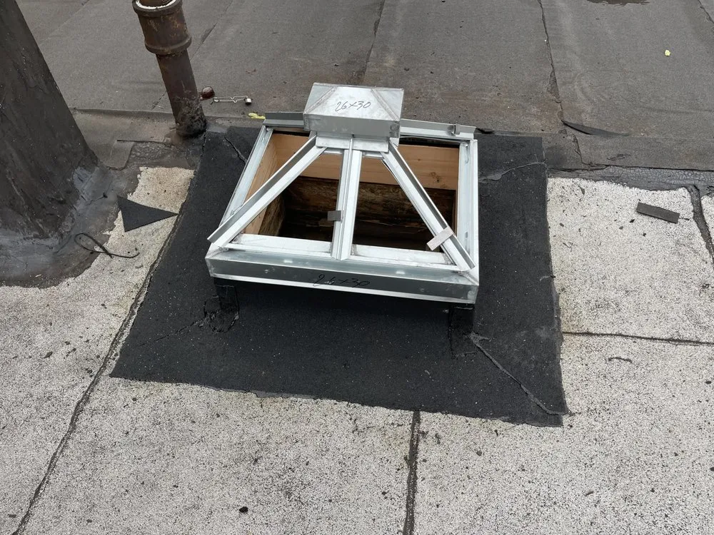 Slide of NYC Rooftop Contractor