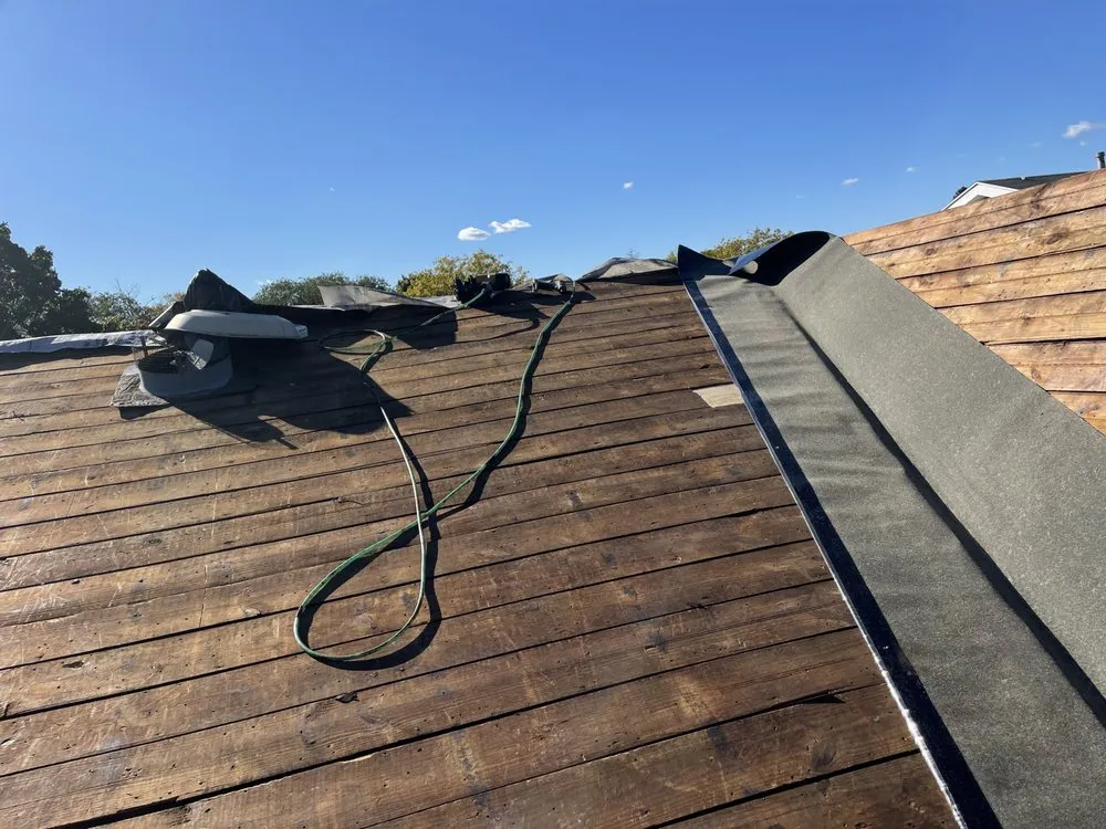 Slide of NYC Rooftop Contractor