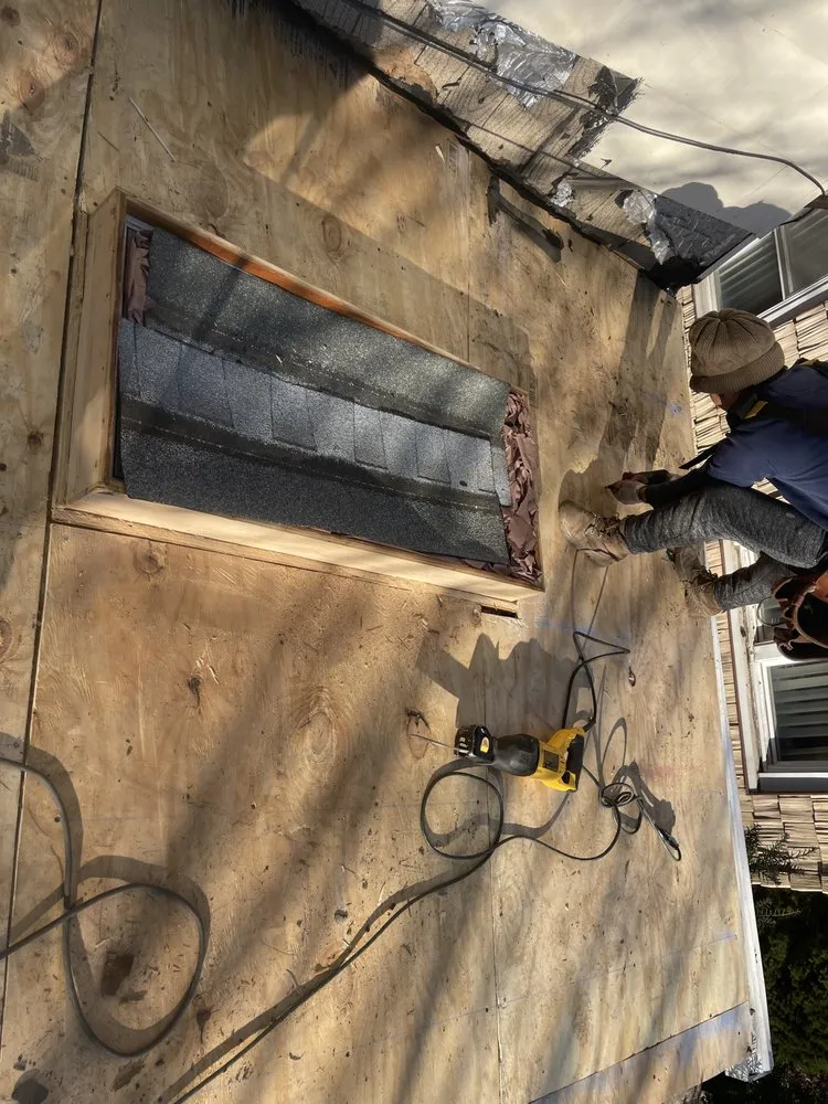 Slide of NYC Rooftop Contractor