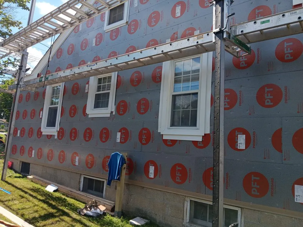 Slide of NYC Rooftop Contractor