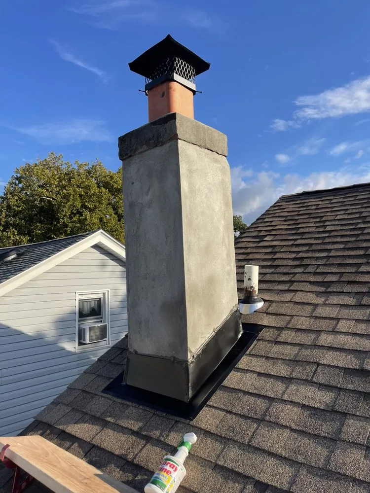 Slide of NYC Rooftop Contractor