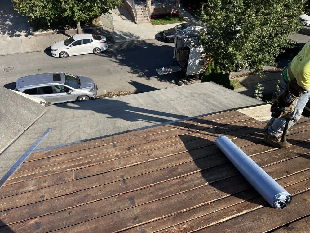 Slide of NYC Rooftop Contractor