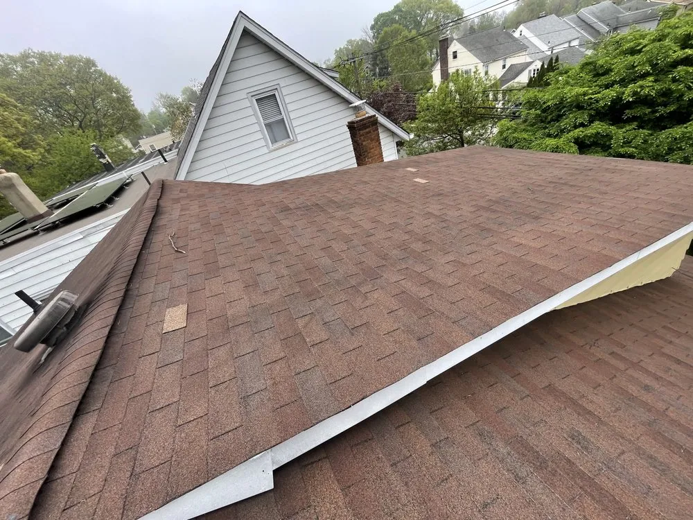 Slide of NYC Rooftop Contractor