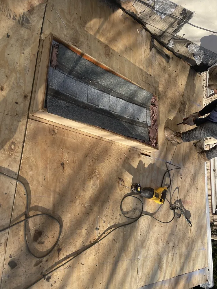 Slide of NYC Rooftop Contractor