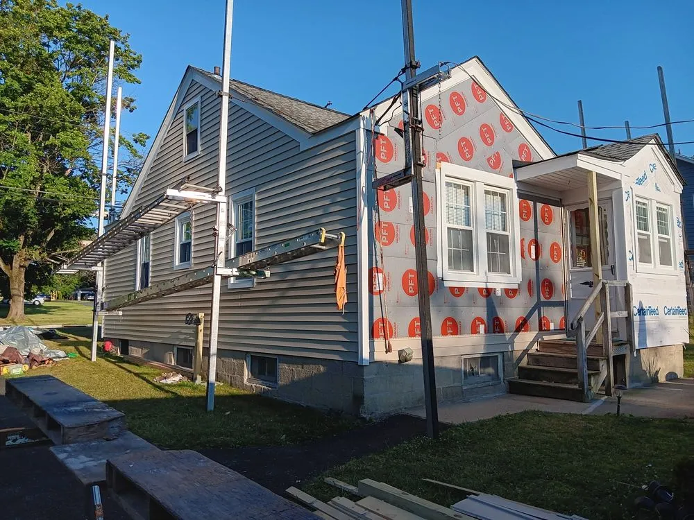 Slide of NYC Rooftop Contractor