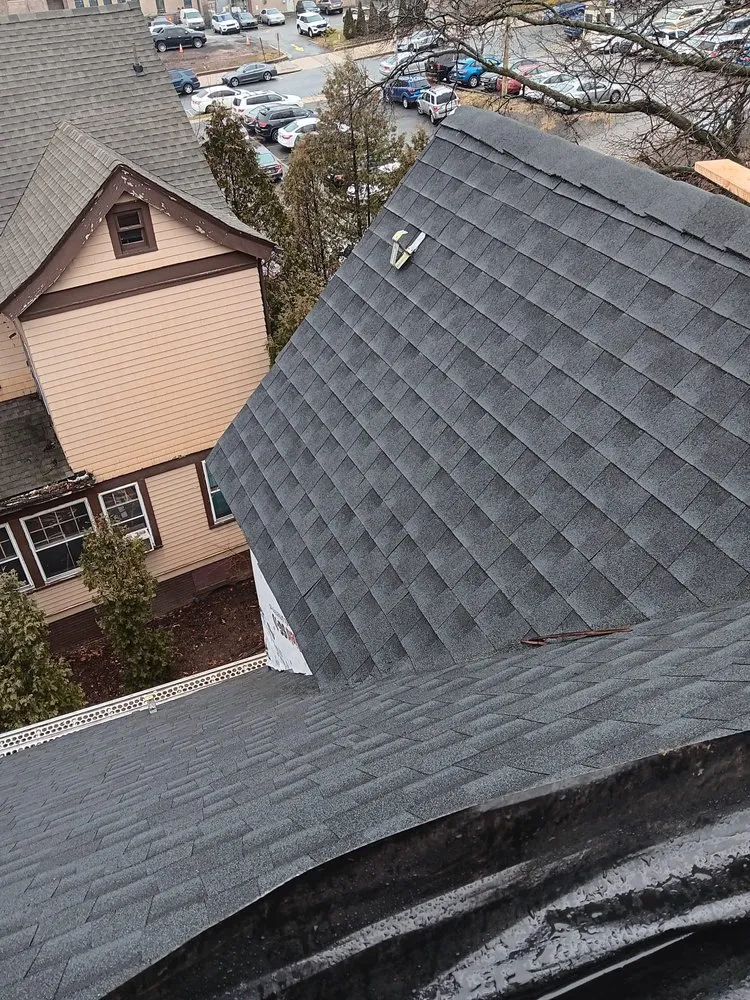 Slide of NYC Rooftop Contractor