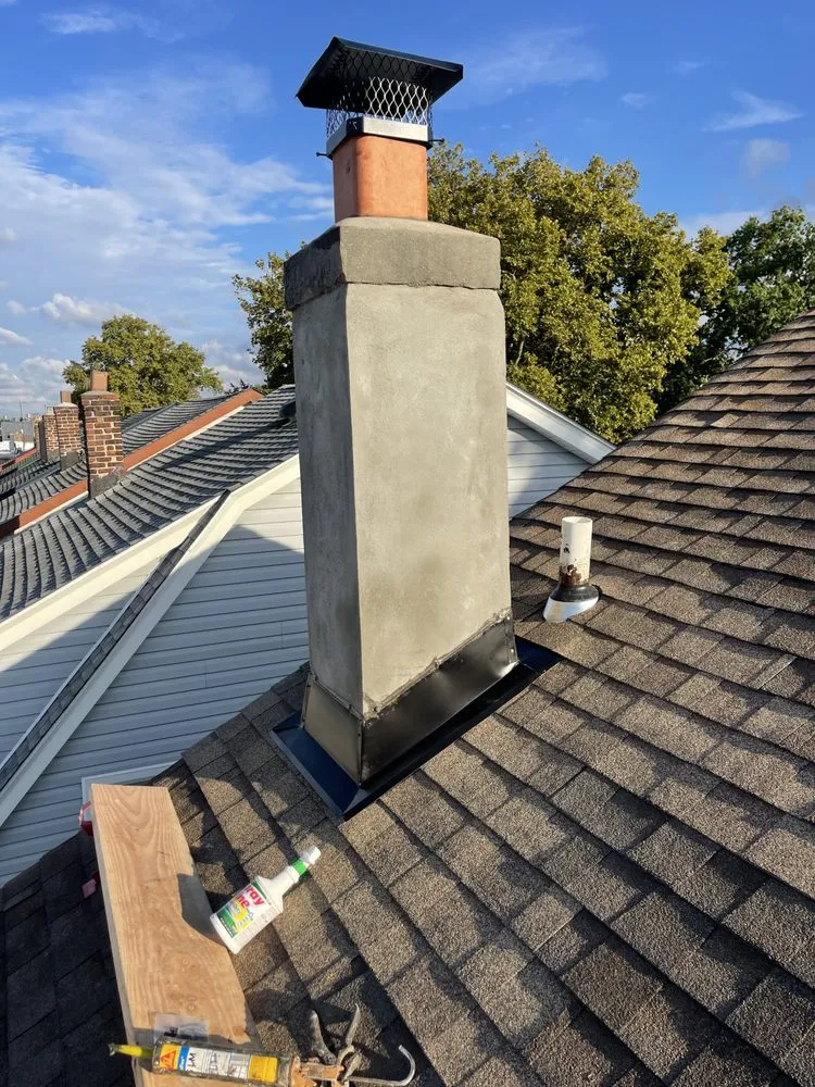 Slide of NYC Rooftop Contractor