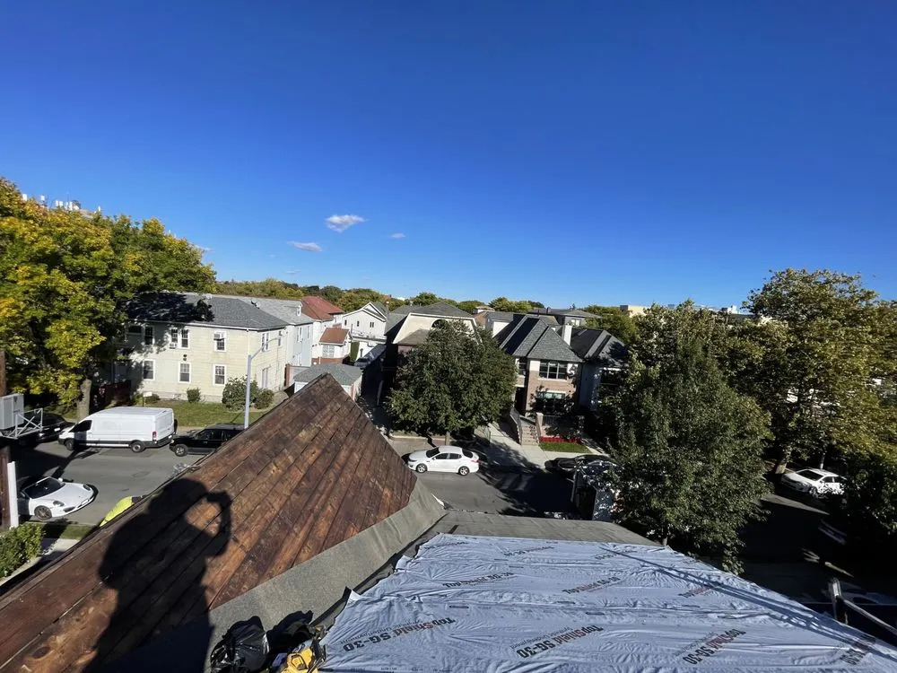 Slide of NYC Rooftop Contractor