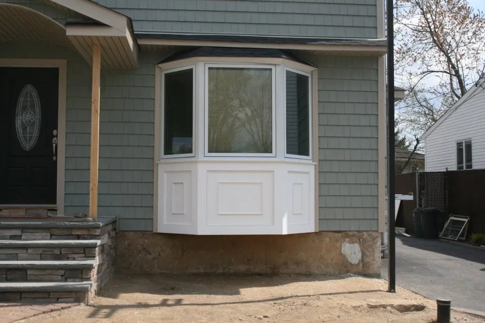 Slide of NY’s Finest Roofing and Siding