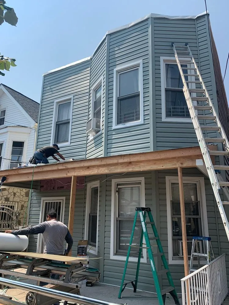 Slide of NY’s Finest Roofing and Siding