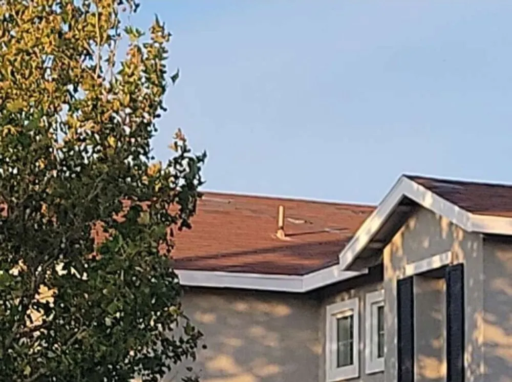 Slide of Oak Hills Roofing