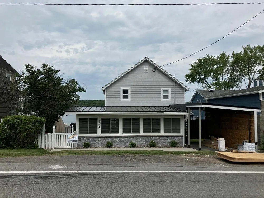 Slide of Oaks Roofing and Siding