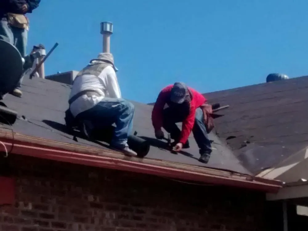 Slide of Oasis Roofing