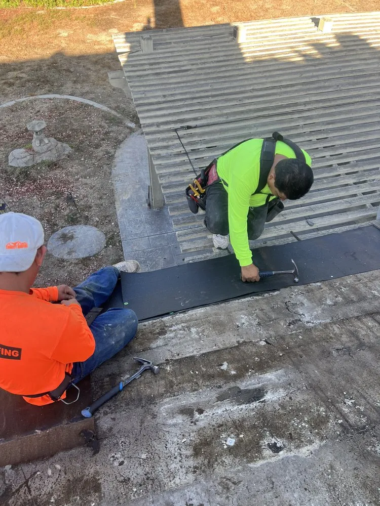 Slide of Obie's Roofing