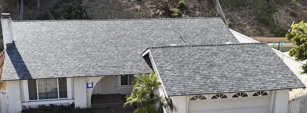 Slide of Obie's Roofing