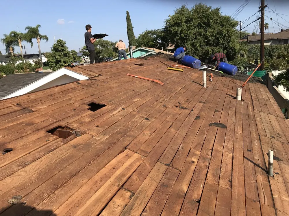 Slide of OC Custom Roofing