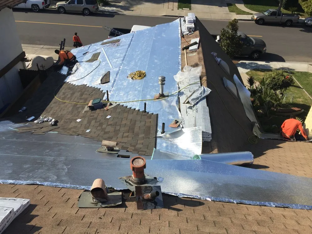 Slide of OC Custom Roofing