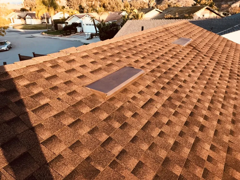 Slide of OC Custom Roofing