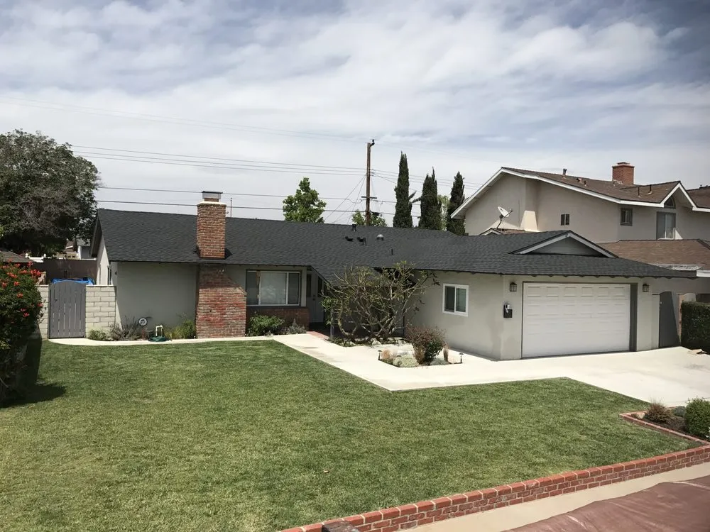 Slide of OC Custom Roofing