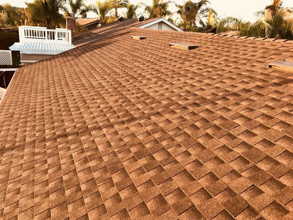 Slide of OC Custom Roofing