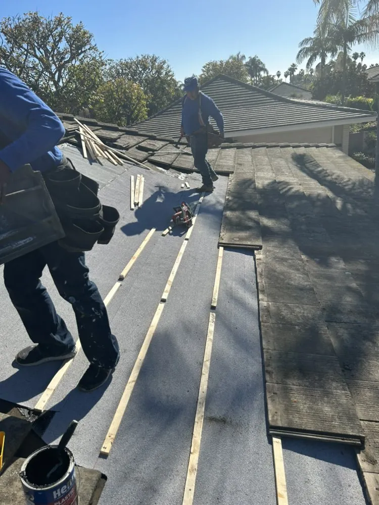 Slide of OC Roof Contractors