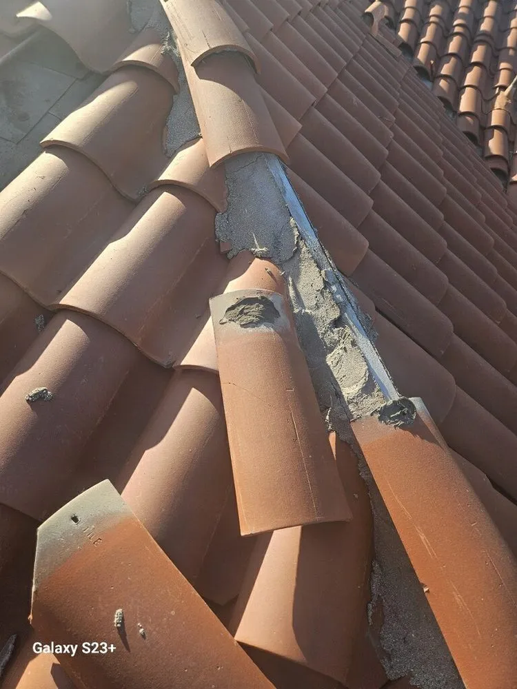 Slide of OC Roof Contractors