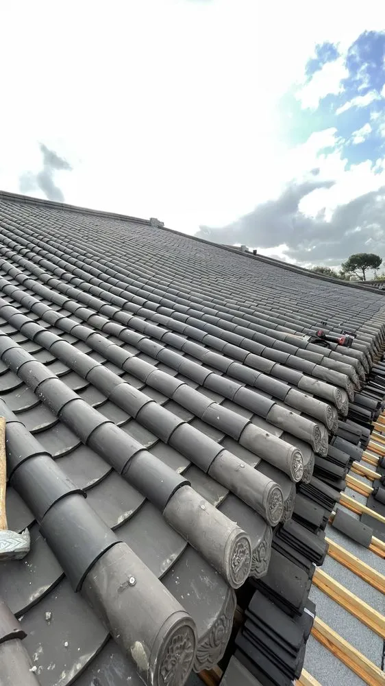 Slide of OC Roofing & Construction