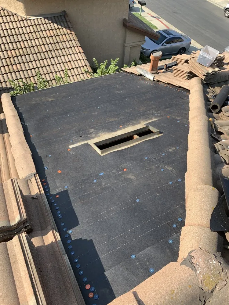 Slide of OC Roofing & Construction