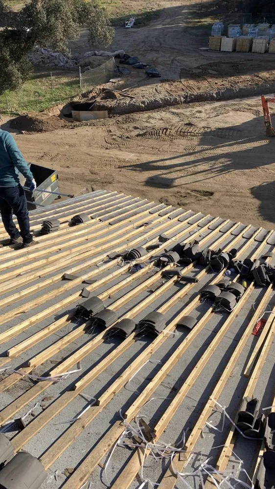 Slide of OC Roofing & Construction