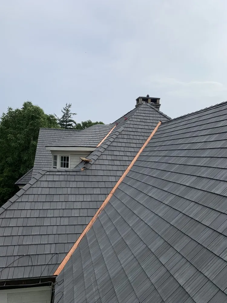 Slide of O.C. Roofing and Siding