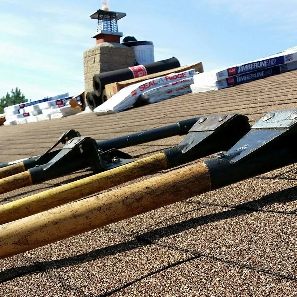 Emergency roof replacement after storm damage in Wakefield, RI by Ocean Breeze Property Services